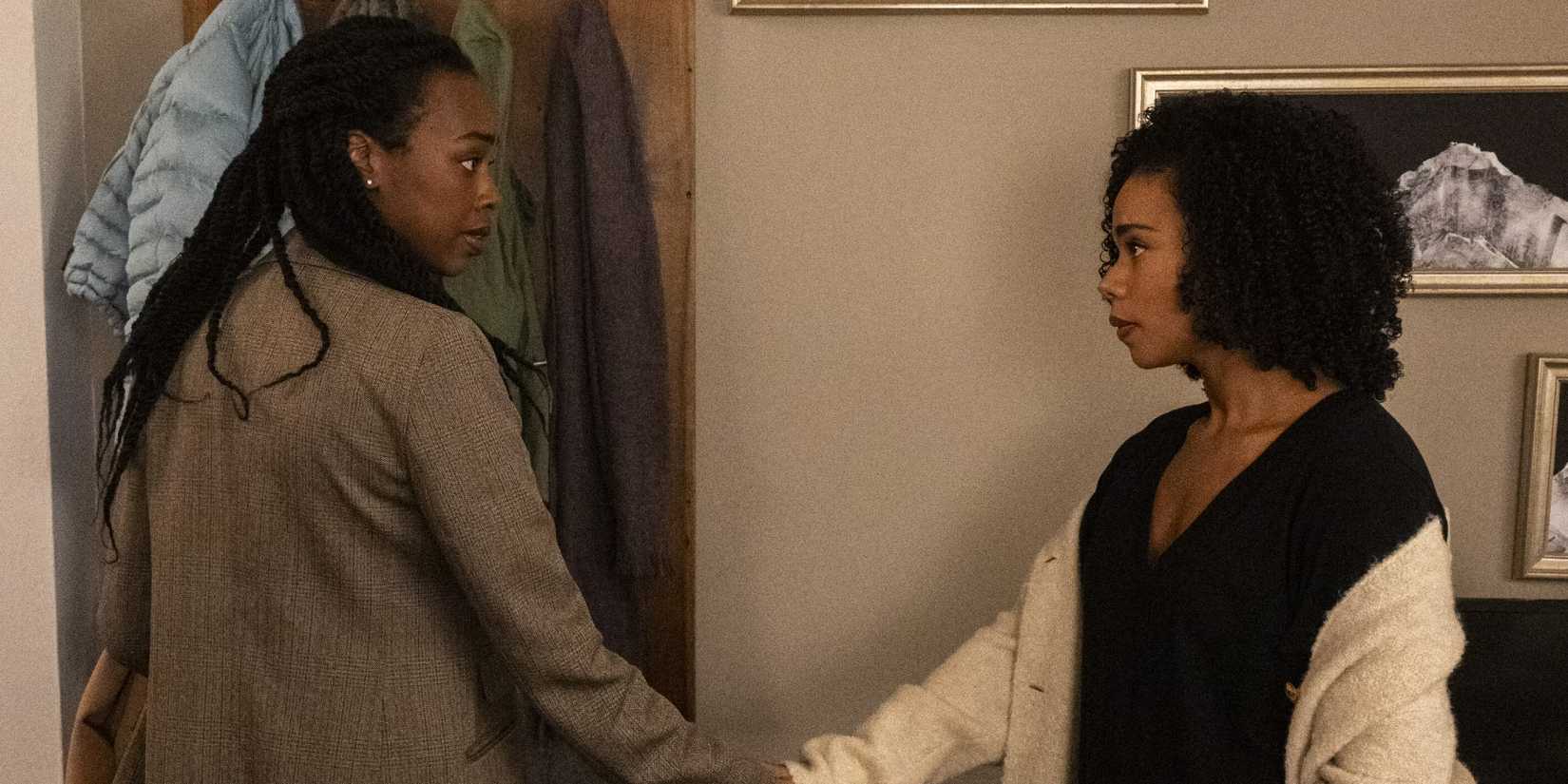 Fedna Jacquet as Charlotte and Roxy Sternberg as Sheryll Barnes holding hands in FBI Most Wanted.