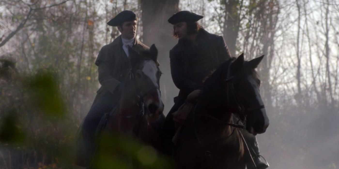 George (Jack Farthing) and Ross (Aidan Turner) on horses in Poldark