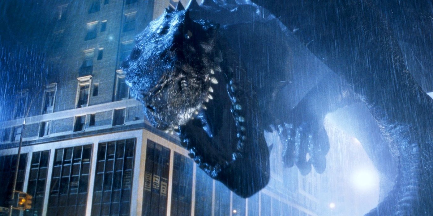 Godzilla che ruggisce sotto la pioggia durante le riprese del film