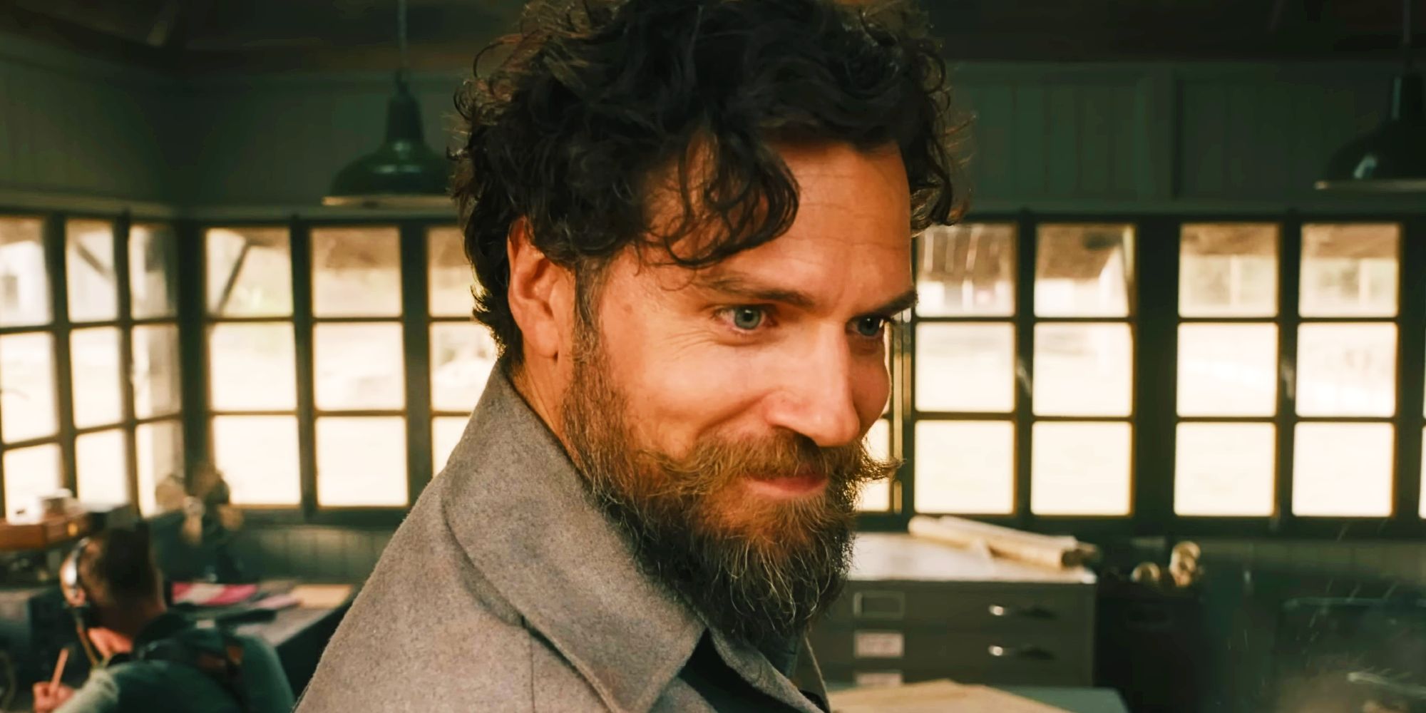 Henry Cavill as Gus smirking in The Ministry of Ungentlemanly Warfare