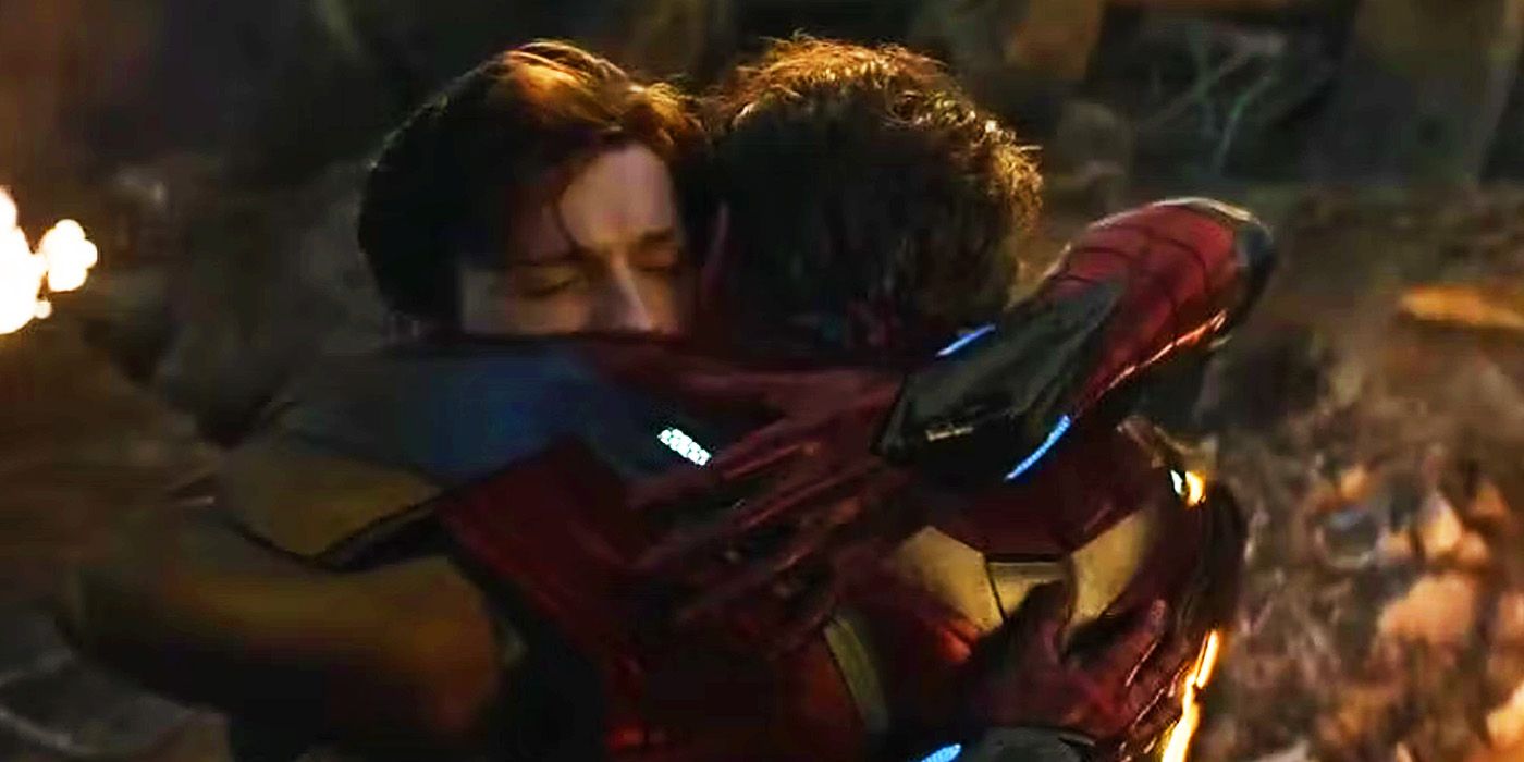 Iron Man and Spider-Man hugging on the battlefield in Avengers Endgame