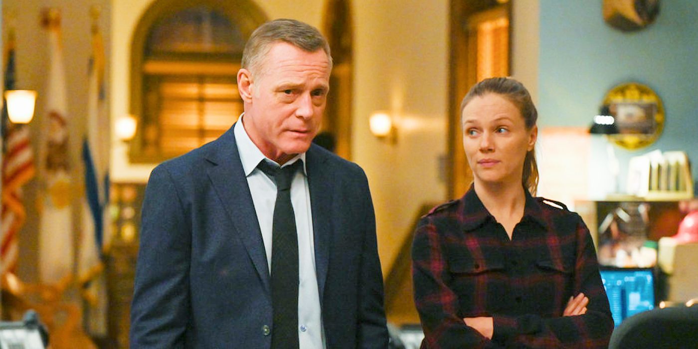 Tracy Spiridakos as Upton looking sideways at Jason Beghe as Voight in Chicago PD