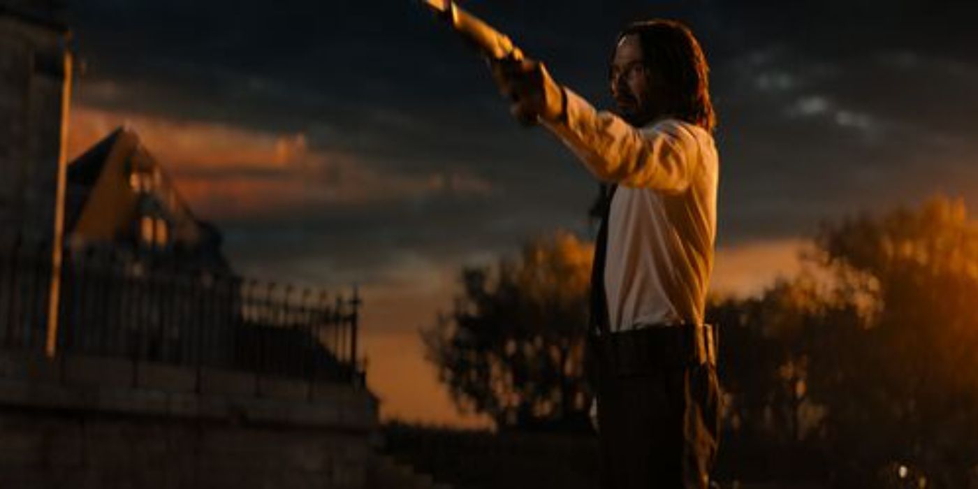 John Wick points a gun at Cane in John Wick 4