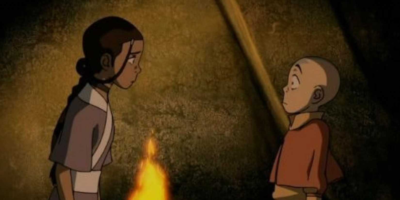 Katara and Aang looking worried while they talk in the animated Avatar The Last Airbender episode The Cave of Two Lovers