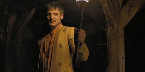 Oberyn Martell in Game of Thrones season 4 holding a torch
