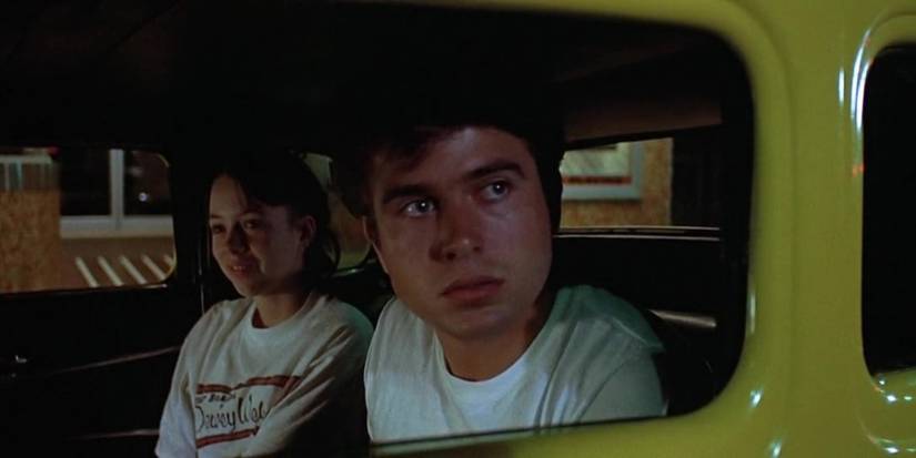 John Milner in a yellow car in American Graffiti