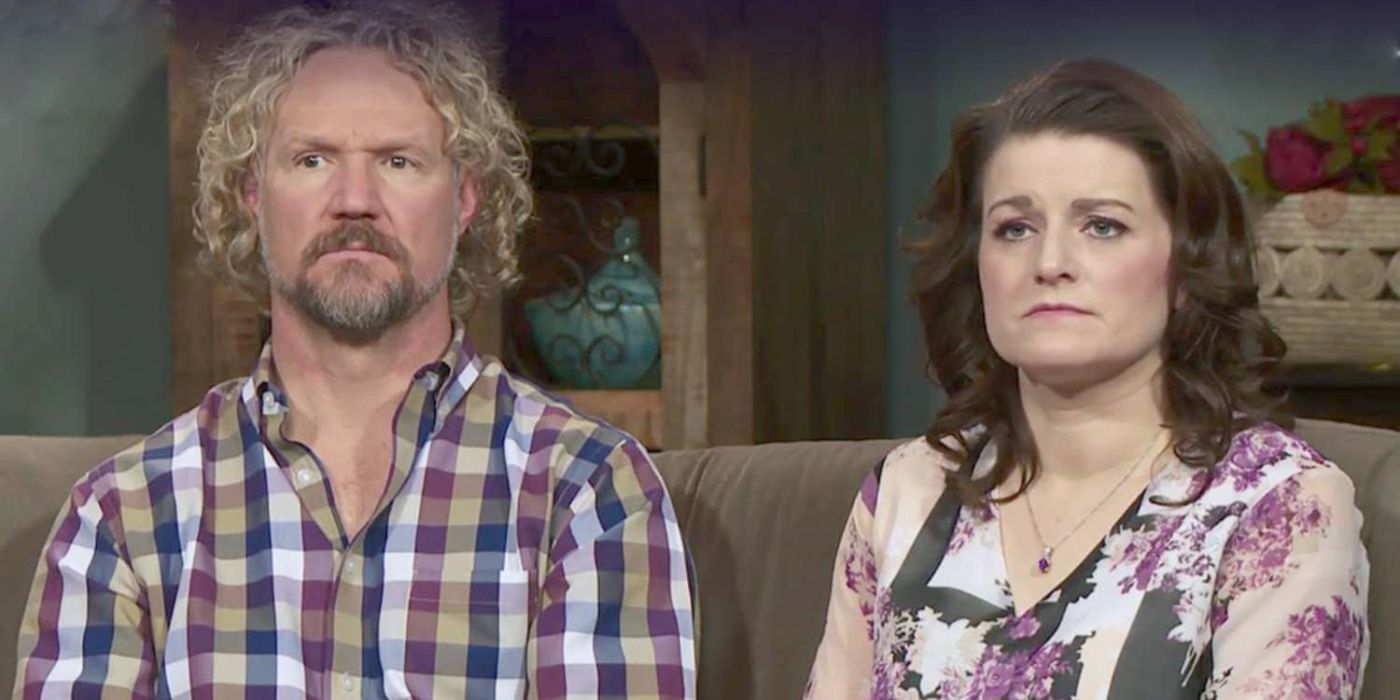 Robyn Kody Brown Sister Wives Looking At Camera looking somber sitting on couch