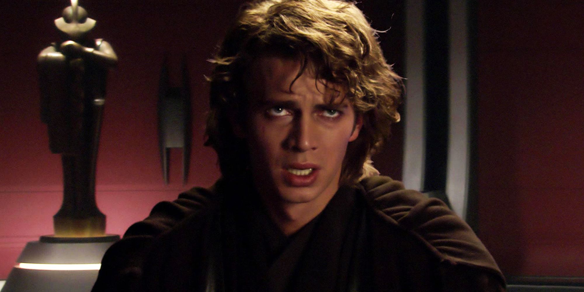 Hayden Christensen's Anakin Skywalker falls to the dark side and is christened Darth Vader, and he looks up at Palpatine in agony
