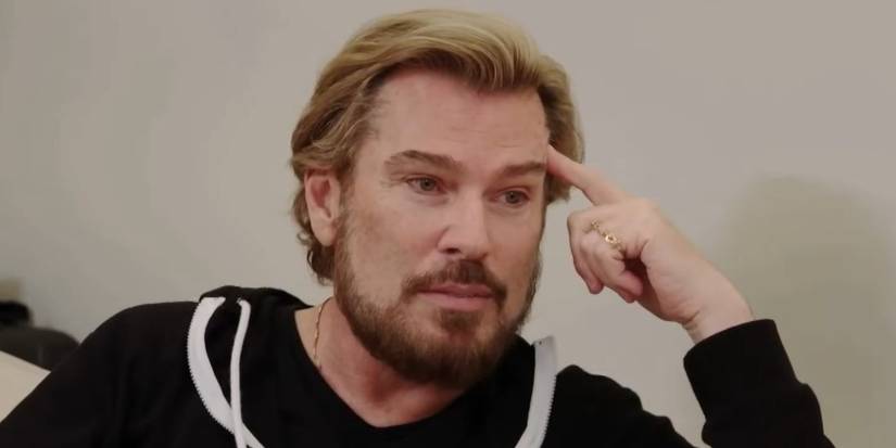 Shawn in 90 Day Fiance thinking in black hoodie
