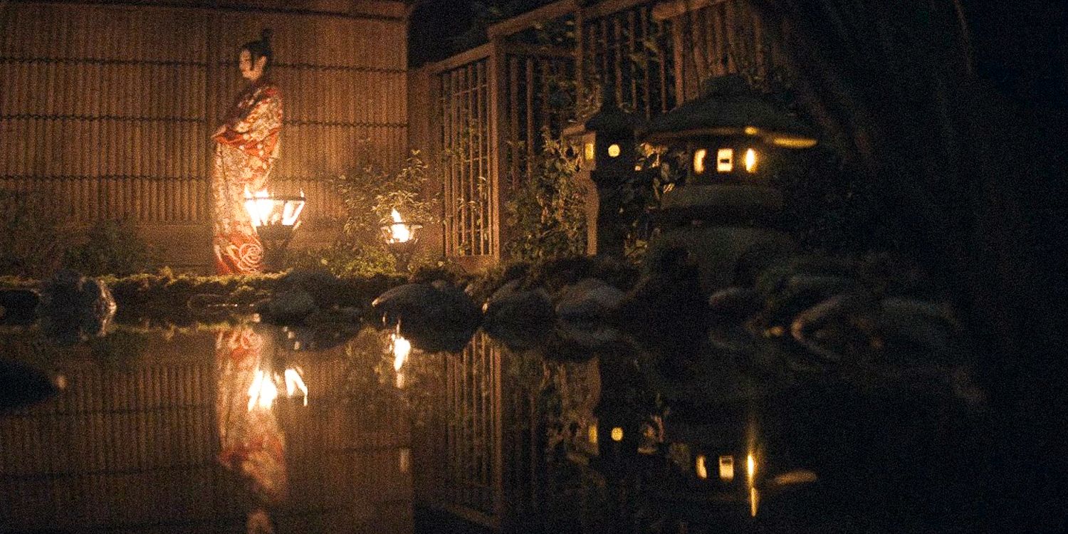 Kiku walking through a garden with a pond in Shogun season 1 ep6