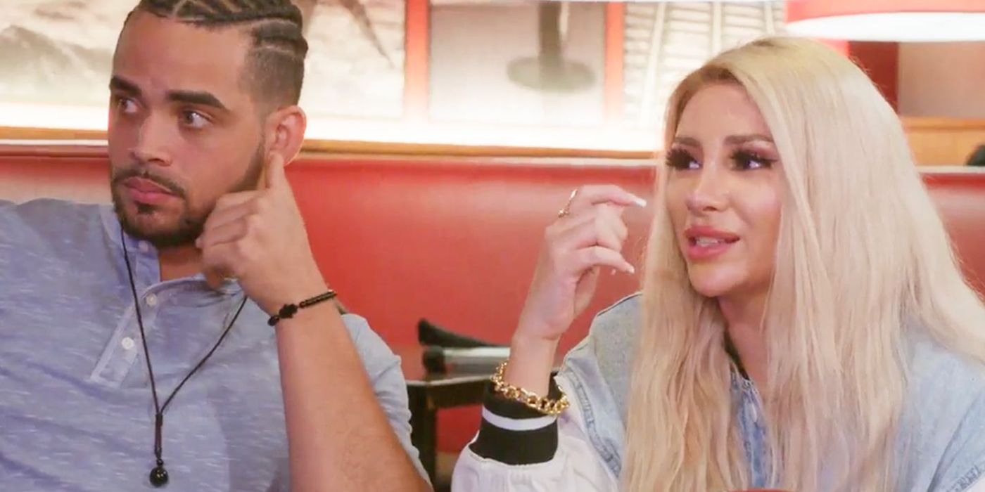 Sophie Sierra Rob Warne In 90 Day Fiance sitting down together at a table