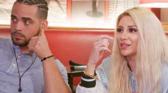 Sophie Sierra Rob Warne In 90 Day Fiance sitting down together at a table
