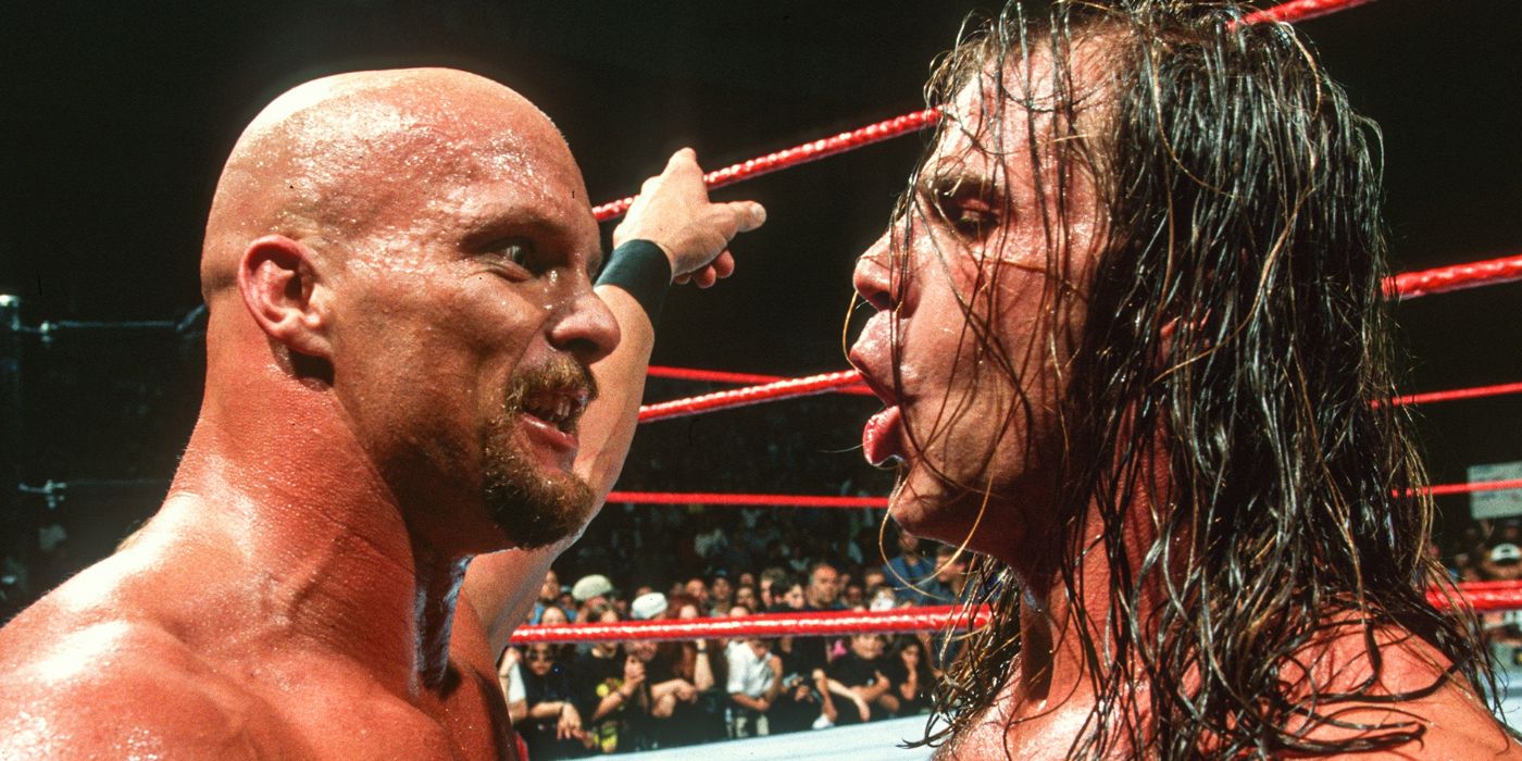 Stone Cold Steve Austin standing face to face with Shawn Michaels