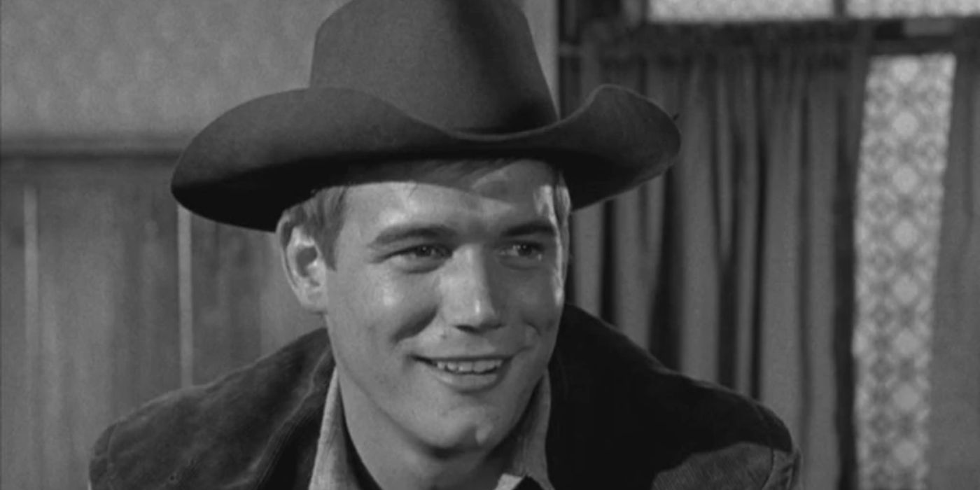 Thad Greenwood (Roger Ewing) laughing in Gunsmoke.