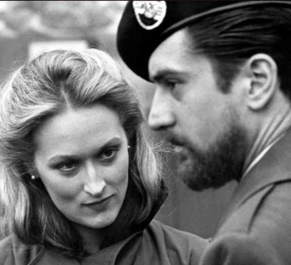Meryl Streep and Robert DeNiro look intense in The Deer Hunter in black and white
