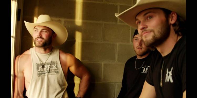 The McBee Dynasty's Cole McBee, Jesse McBee and Steven McBee Jr. looking out a window