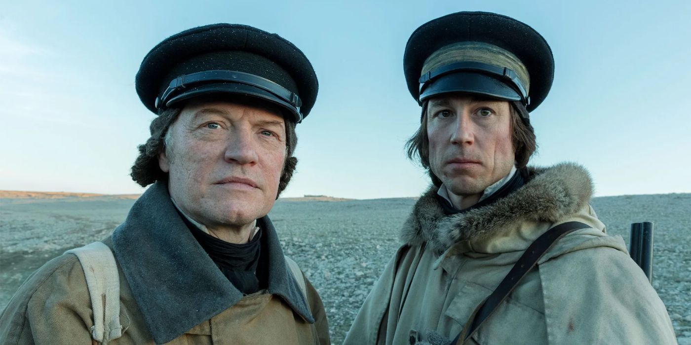 Crozier and Fitzjames gaze resolutely into the distance against a chilly Arctic backdrop in a scene from The Terror season 1