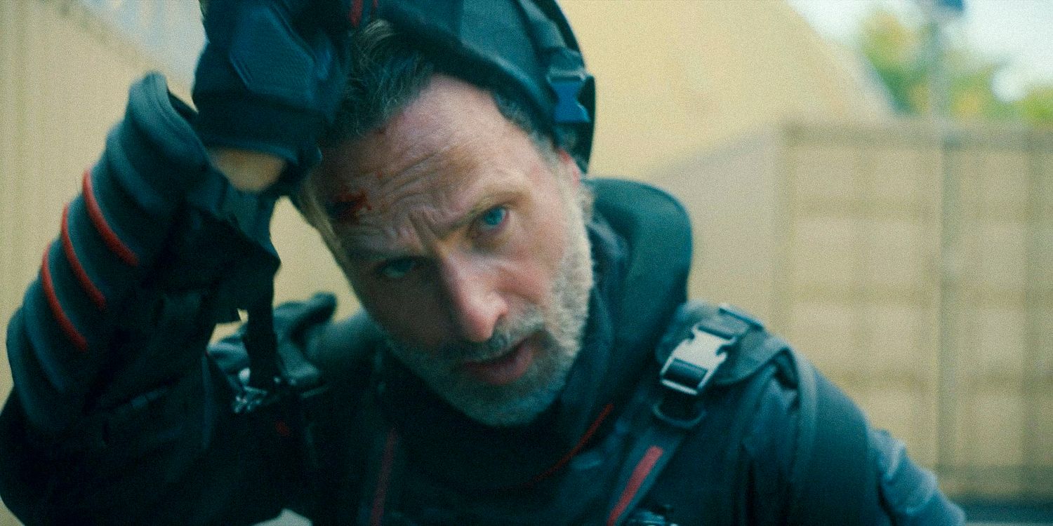 Close-up of Rick Grimes removing the protective mask from the CRM uniform in The Walking Dead the Ones Who Live S1 Ep6 trailer