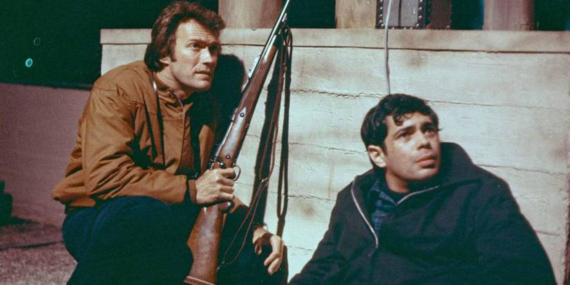 Harry and Inspector Chico hiding with a gun in Dirty Harry