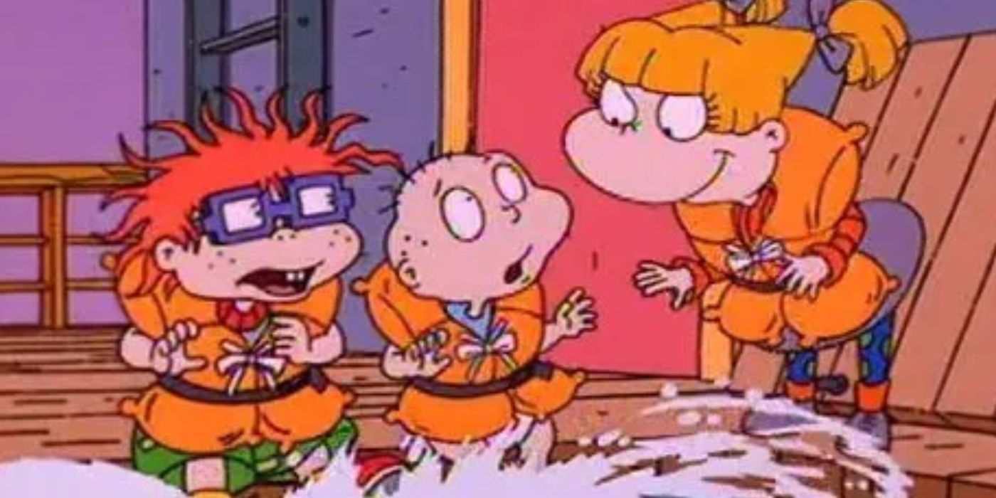 Tommy, Chuckie e Angelica circondati dall’acqua con giubbotti salvagente