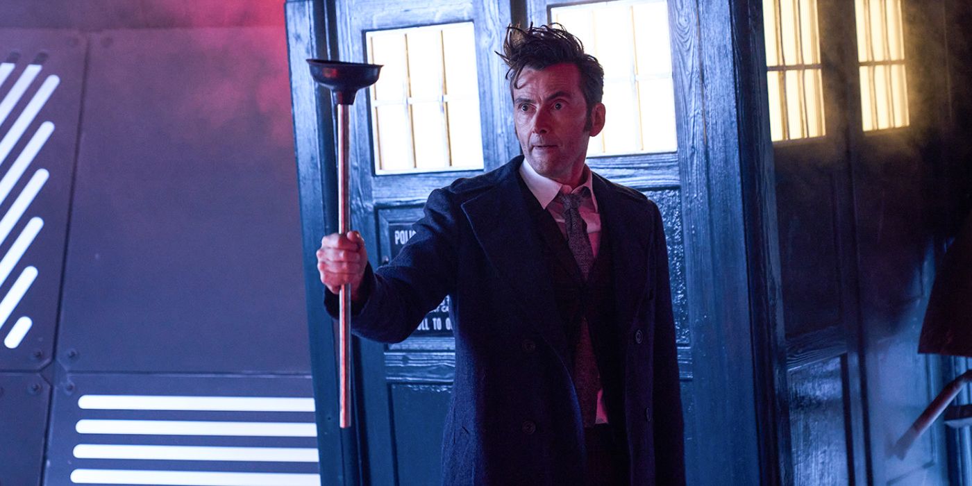 The Fourteenth Doctor holding a Dalek plunger outside the TARDIS in the Children in Need skit Destination: Skaro