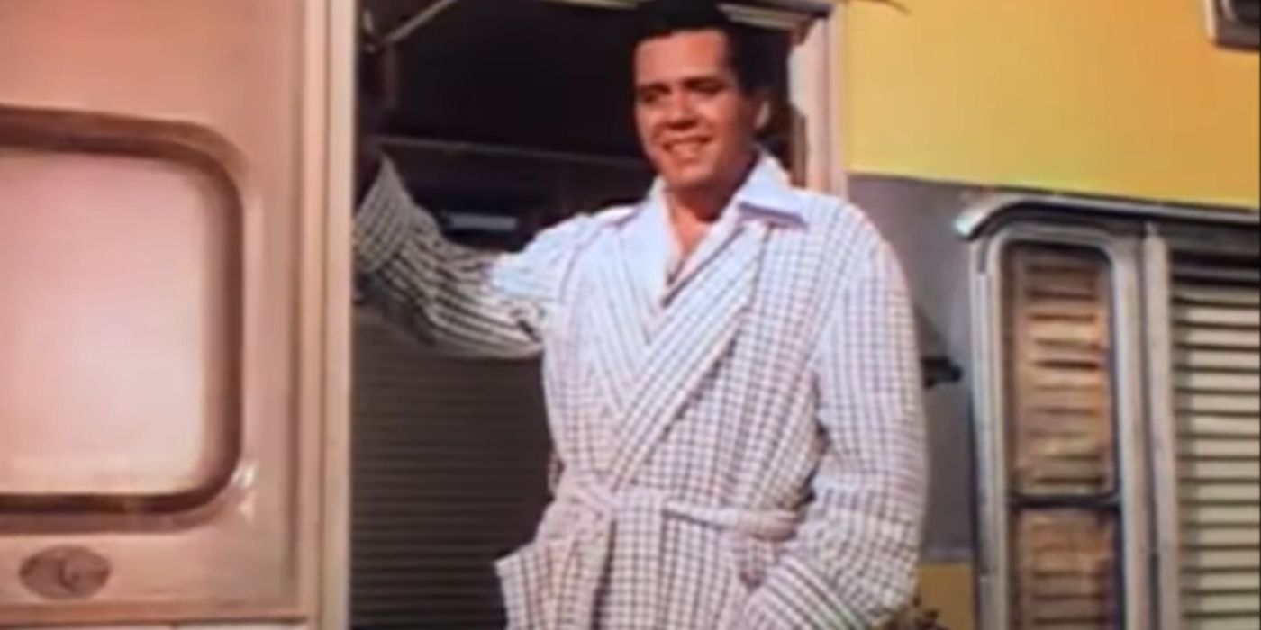 Desi Arnaz as Nicky standing in the trailer doorway in The Long, Long Trailer (1953)