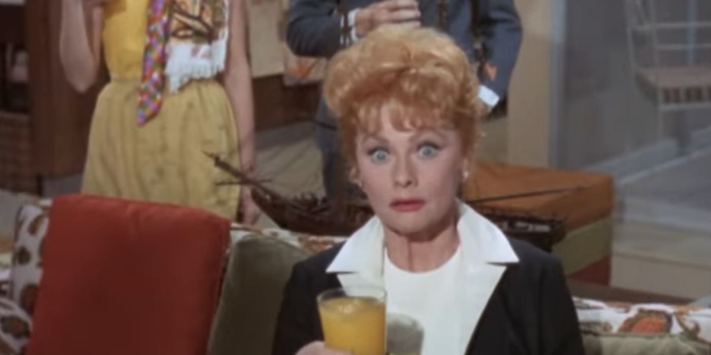 Helen looking shocked and holding a glass of juice in Yours, Mine, and Ours (1968)