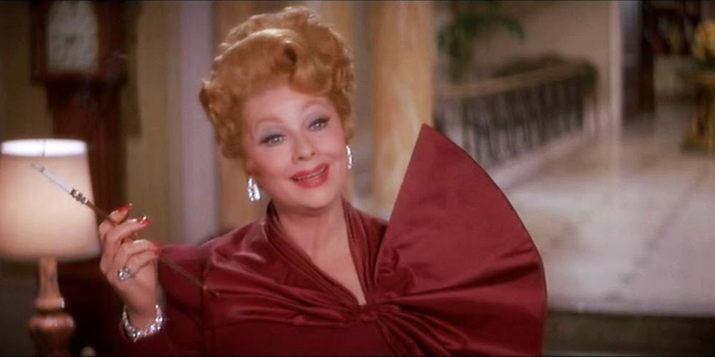 Lucille Ball as Mame Dennis smoking a cigarette in Mame (1974)
