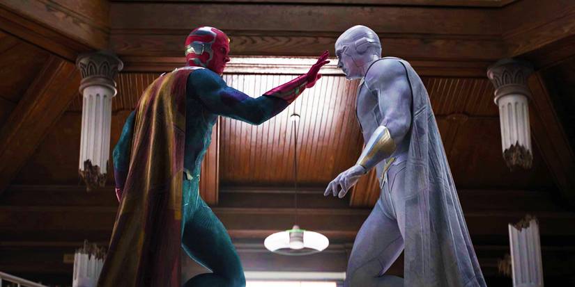 Vision and White Vision coming to an agreement, with Vision touching White Vision's forehead, in WandaVision