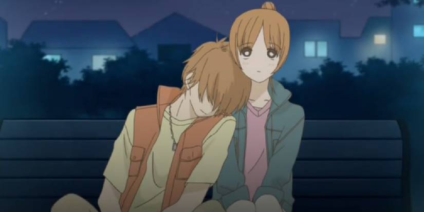 We Were There anime's characters with the boy leaning his head on the girl's shoulders.