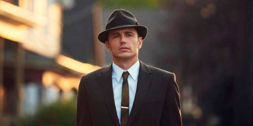 James Franco walks down the street in 11/22/63
