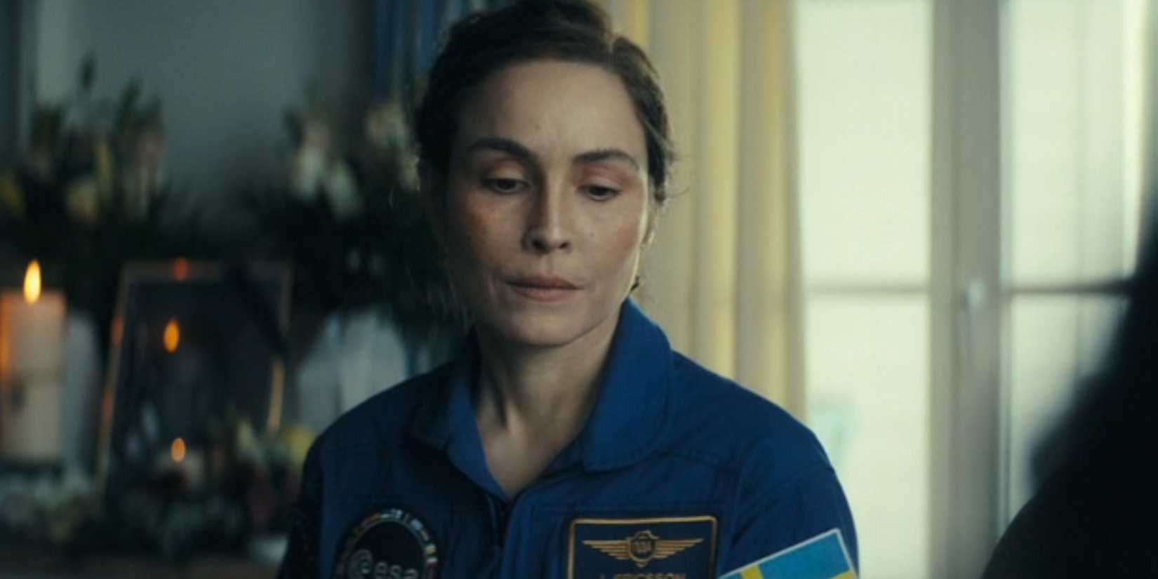 Noomi Rapace looking thoughtful in Constellation