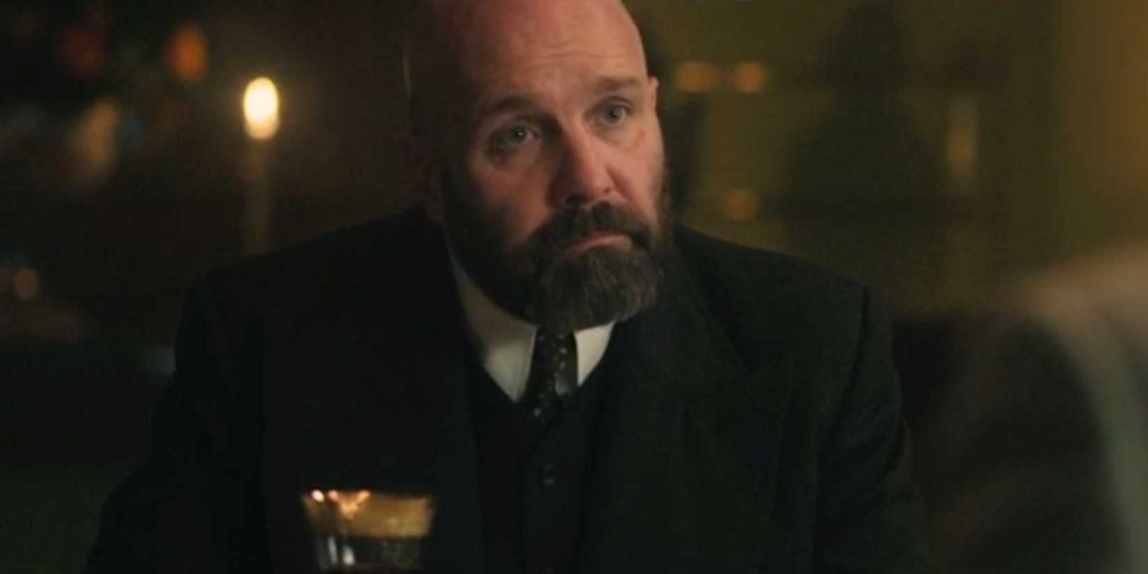 Johnny Harris as Osip Glebnikov frowning in A Gentleman in Moscow