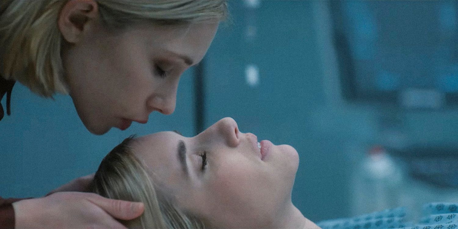 A woman kissing Anna Victoria Alcott on the forehead in American Horror Story Delicate Season 12