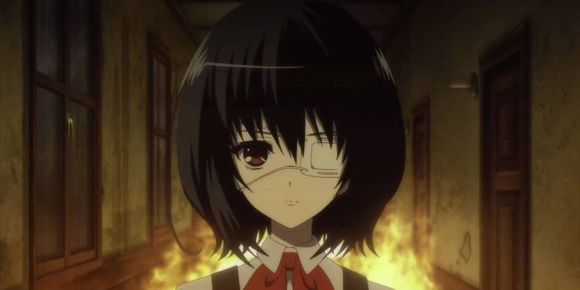 Another Anime's Mei stands in front of a fire and walks away without looking back.