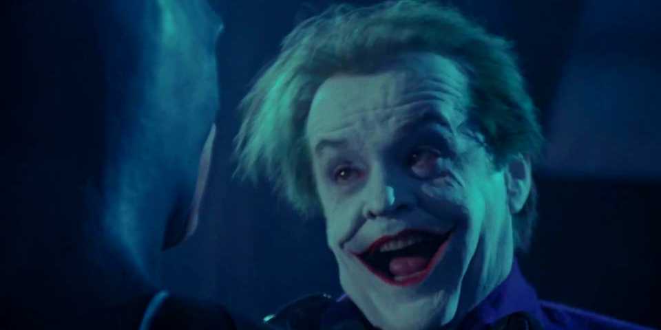 Coringa e Batman em luta