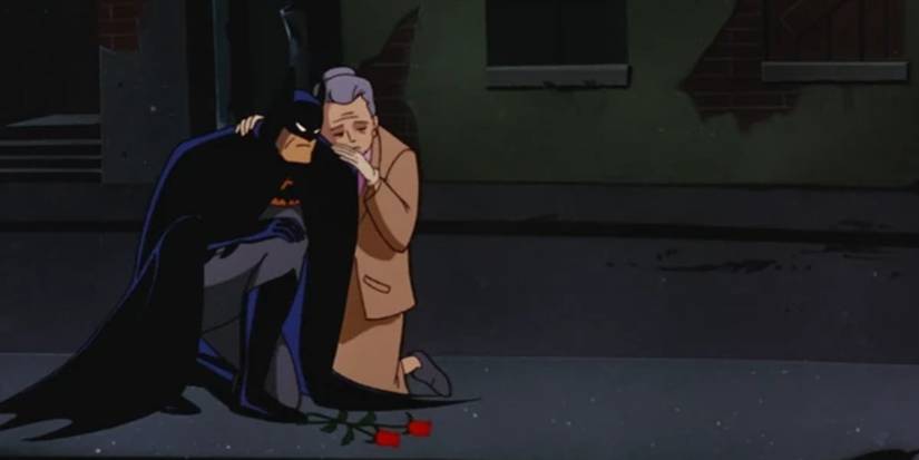 Batman em Batman: A Série Animada depositando flores no Beco do Crime