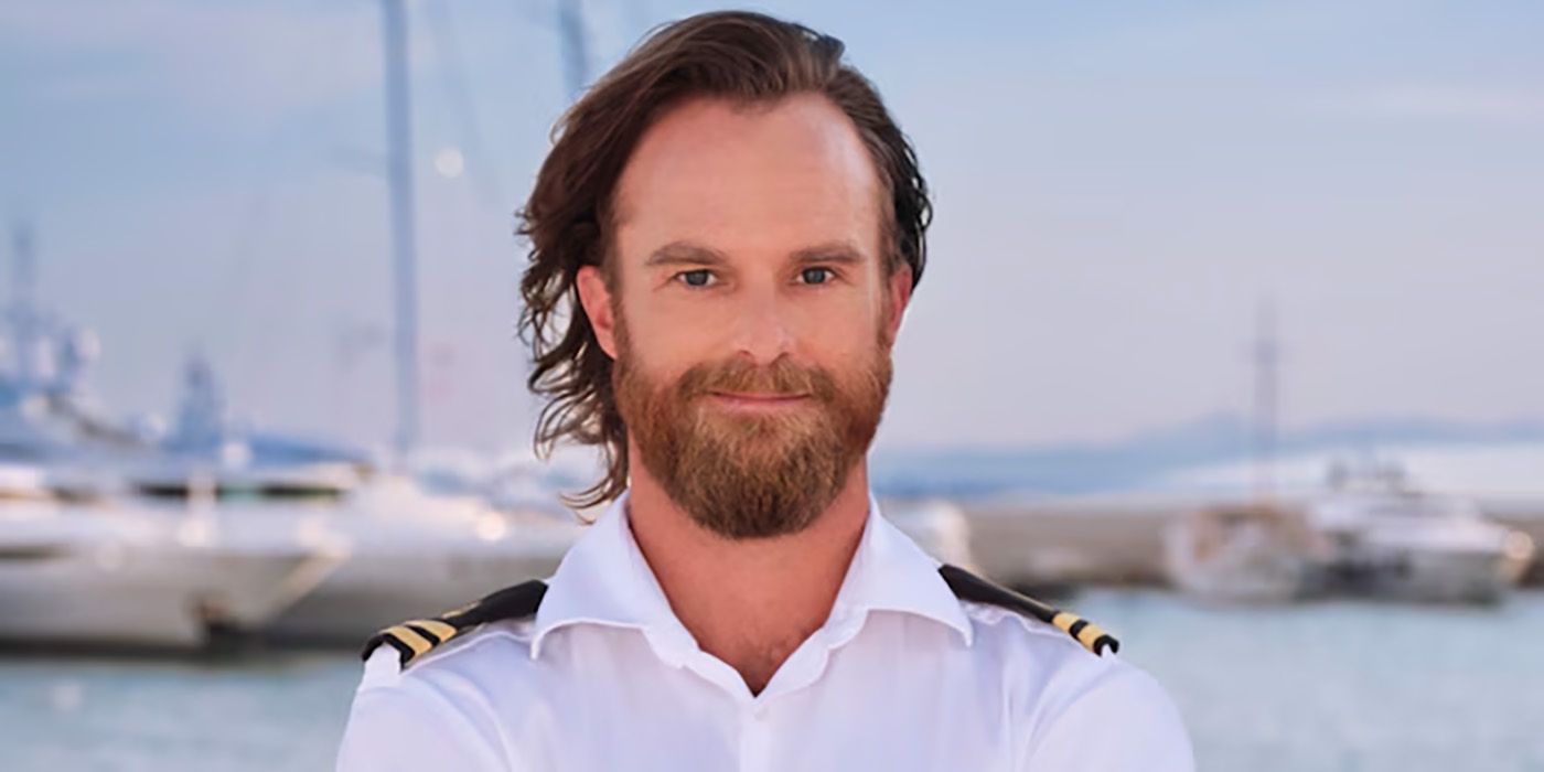 Headshot of Below Deck Med's Iain Maclean, the bosun wears a white shirt promo shot