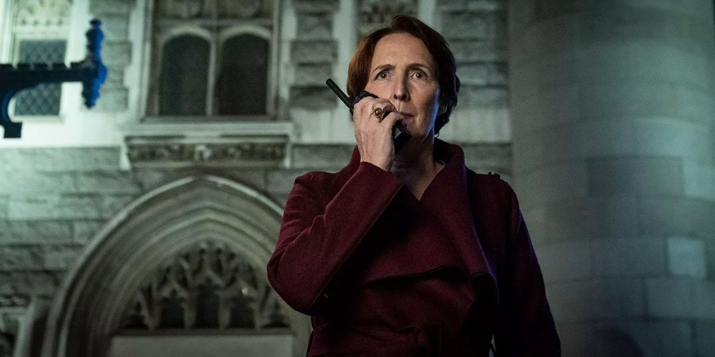 Carolyn (Fiona Shaw) calling someone on Killing Eve