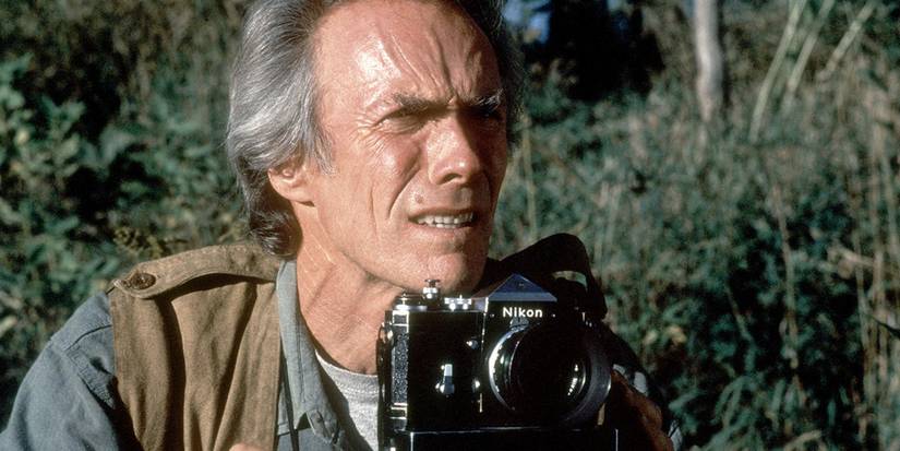 Clint Eastwood holds a camera in The Bridges of Madison County