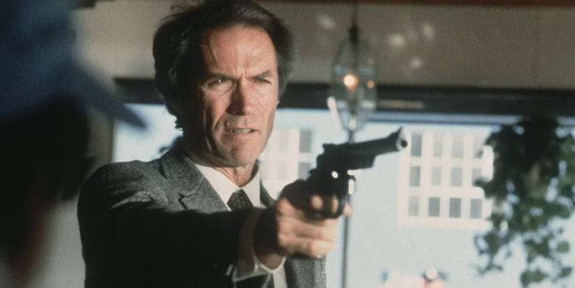 Clint Eastwood poiting a gun in Sudden Impact