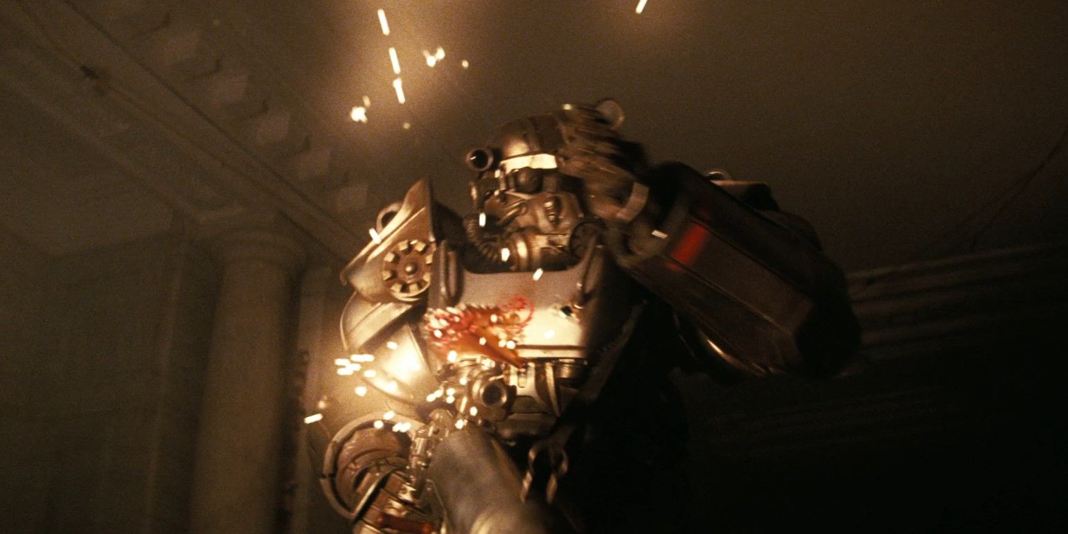 A Brotherhood of Steel knight is shot in the power armor, and the sparks from the bullets impact light up the dark room in Fallout