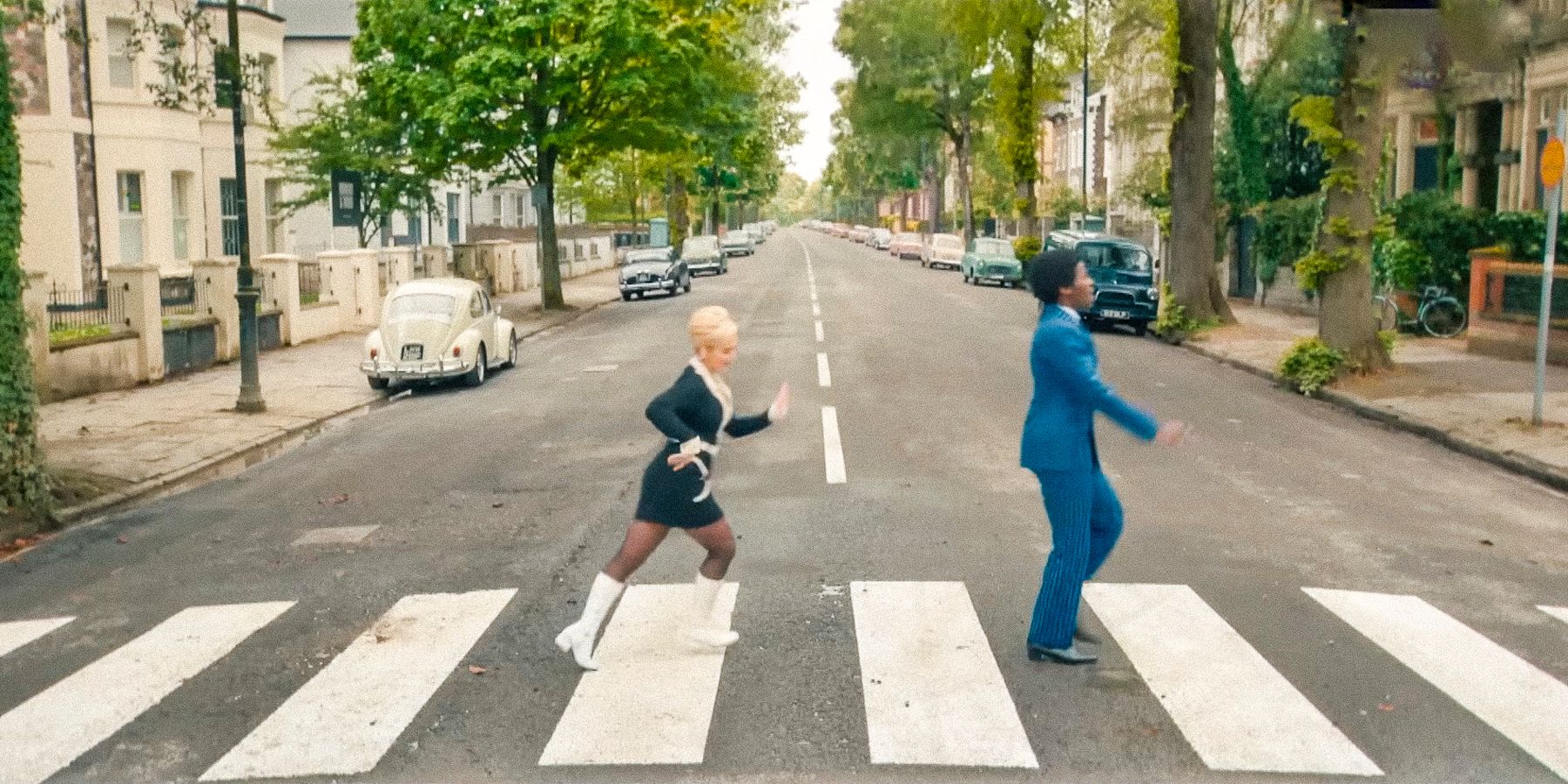 The Doctor and Ruby Sunday in the 1960s crossing Abbey Road in Doctor Who season 14.