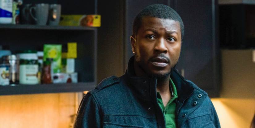 Special Agent Cannon looks shocked at something offscreen in FBI Most Wanted