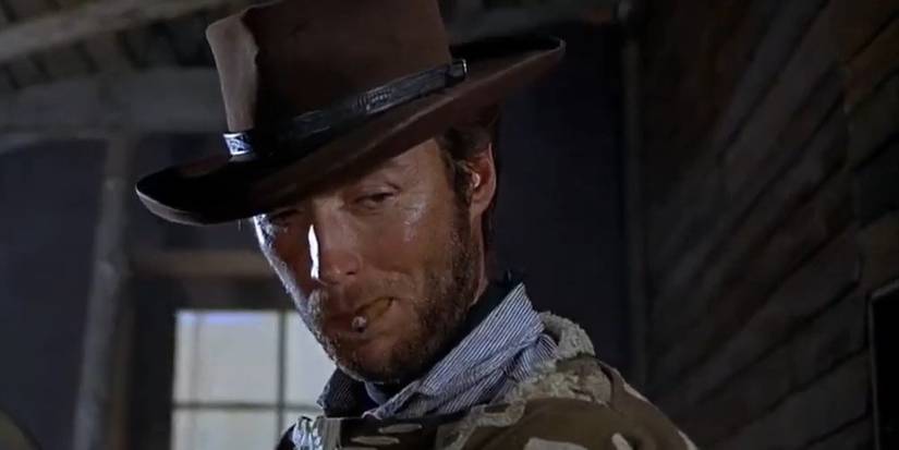 Clint Eastwood looks down with a sarcastic expression in A Few Dollars More
