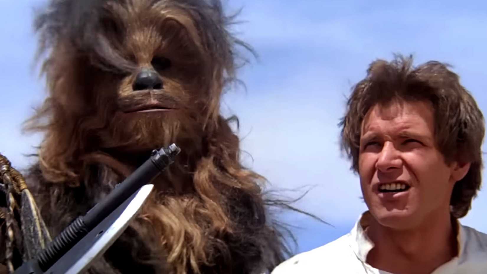 Han Solo desafia e insulta Jabba, o Hutt, enquanto ele e Chewbacca aguardam execução em Star Wars: Episódio VI - O Retorno de Jedi.