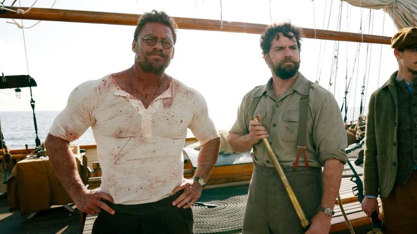 Henry Cavill and Alan Ritchson on a boat in The Ministry of Ungentlemanly Warfare