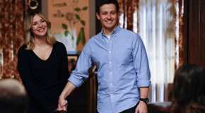 Jamie (Will Estes) and Eddie (Vanessa Ray) holding hands at the Reagan family dinner in Blue Bloods