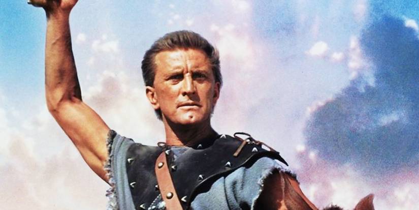 Kirk Douglas holding his sword in the air in Spartacus
