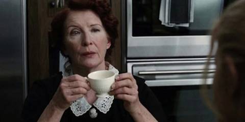 Moira O'Hara with coffee in American Horror Story